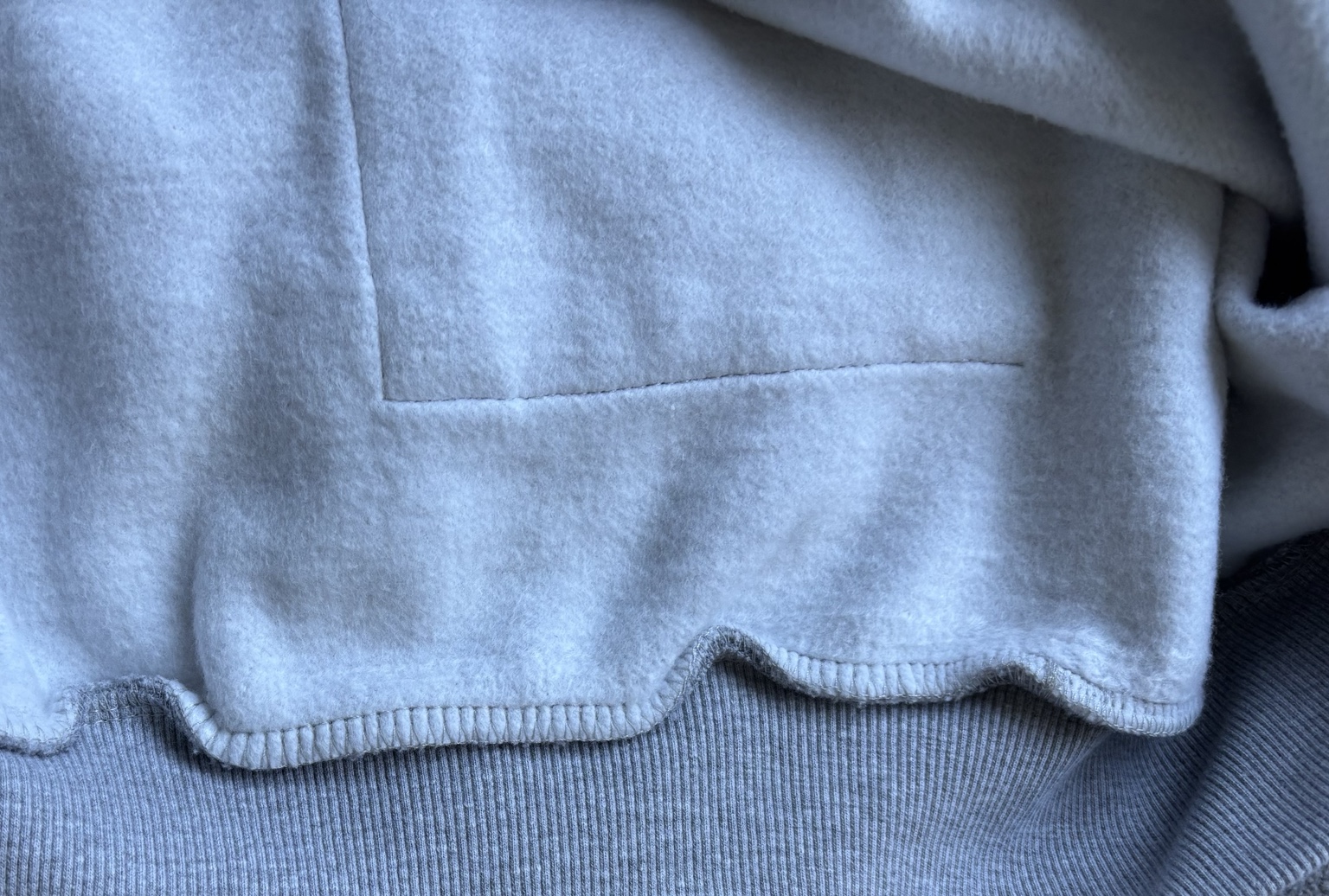 Close-up of the soft brushed inner of the overhead hoodie